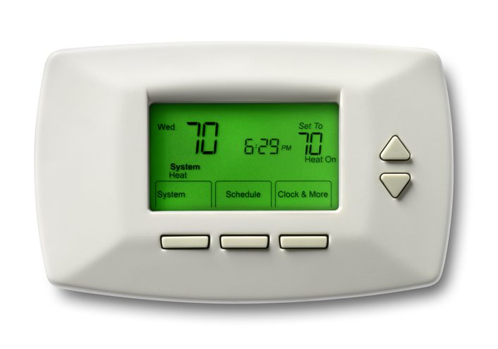 Polk Electric LLC | Programmable thermostat set at 70 degrees